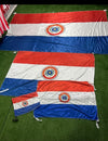 Bandera de Paraguay – 1,50 x 1,00 m / 2,50 x 1,50 m – Tela Resistente – Envío Gratis a Todo el País
